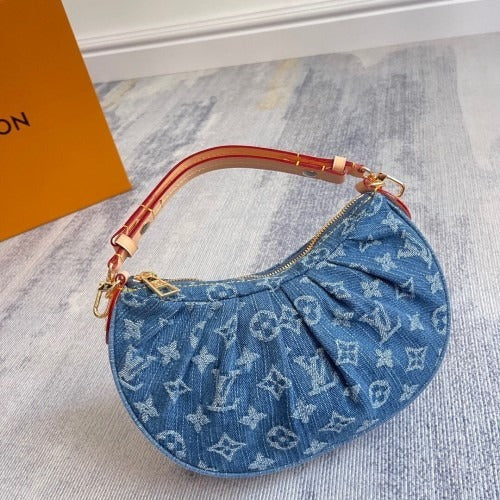 POCHETTE VALLEY BAG BY LOUIS VUITTON